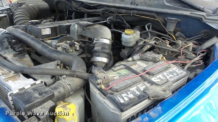 image for item J5725 2001 Dodge Ram 2500 Laramie SLT Quad Cab flatbed pickup truck