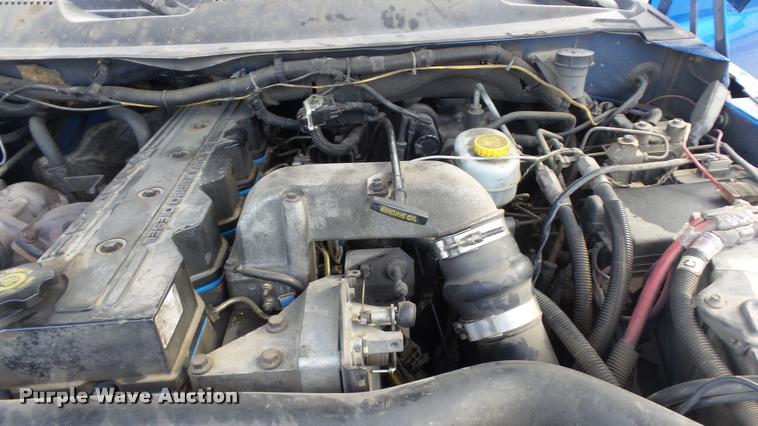 image for item J5725 2001 Dodge Ram 2500 Laramie SLT Quad Cab flatbed pickup truck