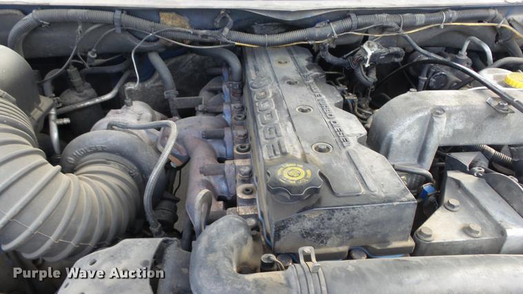 image for item J5725 2001 Dodge Ram 2500 Laramie SLT Quad Cab flatbed pickup truck