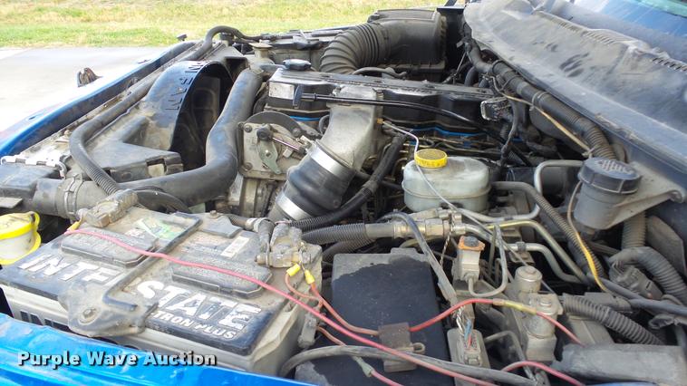 image for item J5725 2001 Dodge Ram 2500 Laramie SLT Quad Cab flatbed pickup truck