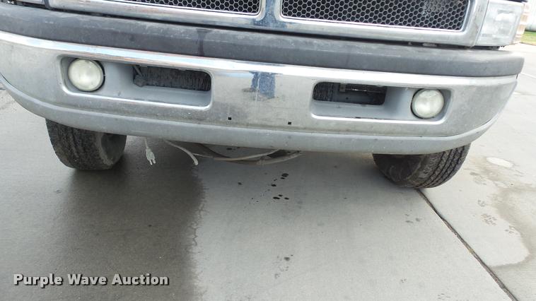 image for item J5725 2001 Dodge Ram 2500 Laramie SLT Quad Cab flatbed pickup truck