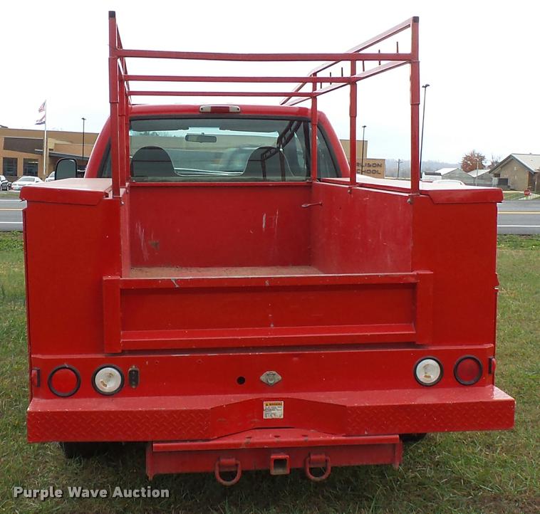 image for item K3426 2003 Ford F250 Super Duty Crew Cab flat bed truck