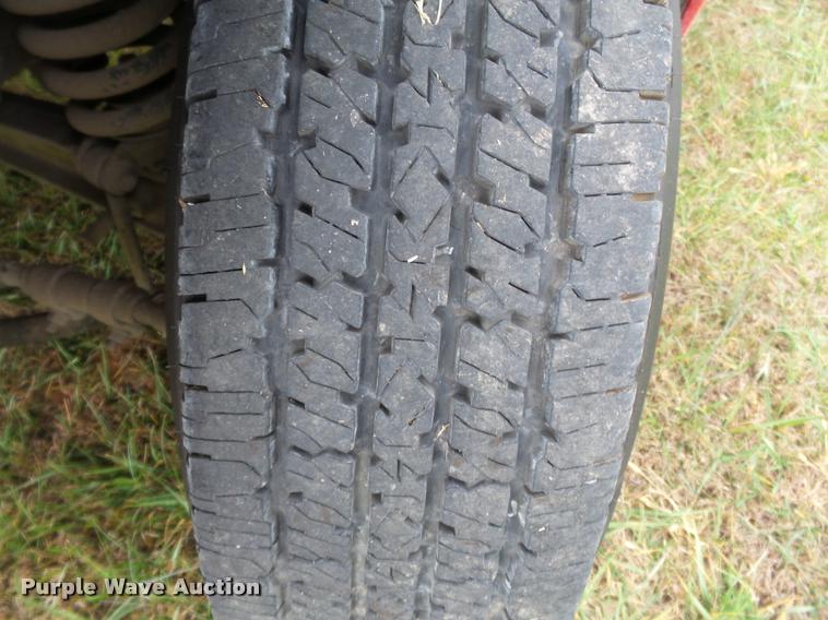 image for item K3426 2003 Ford F250 Super Duty Crew Cab flat bed truck