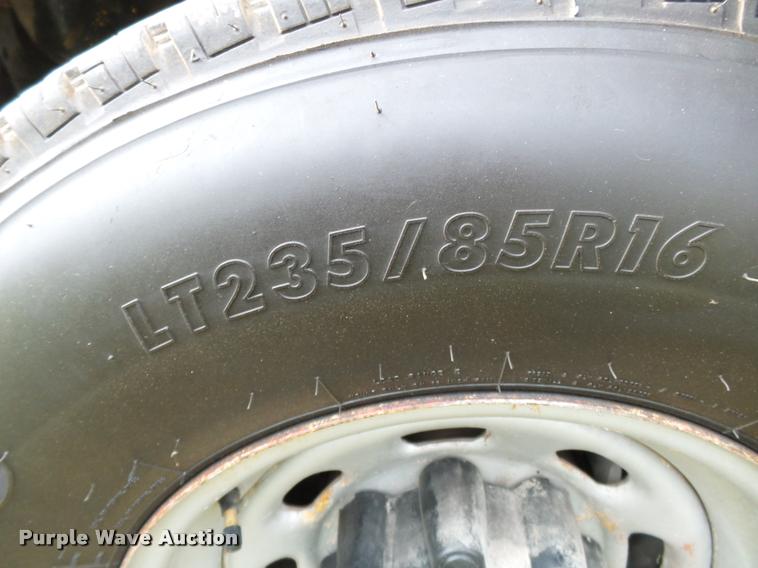 image for item K3426 2003 Ford F250 Super Duty Crew Cab flat bed truck