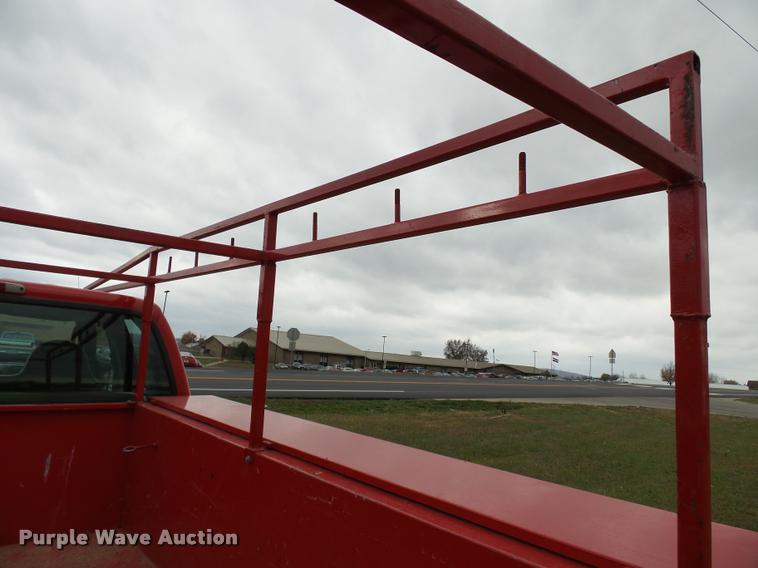 image for item K3426 2003 Ford F250 Super Duty Crew Cab flat bed truck