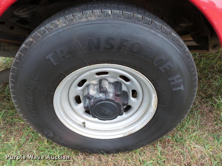 image for item K3426 2003 Ford F250 Super Duty Crew Cab flat bed truck