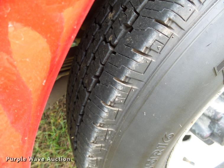 image for item K3426 2003 Ford F250 Super Duty Crew Cab flat bed truck