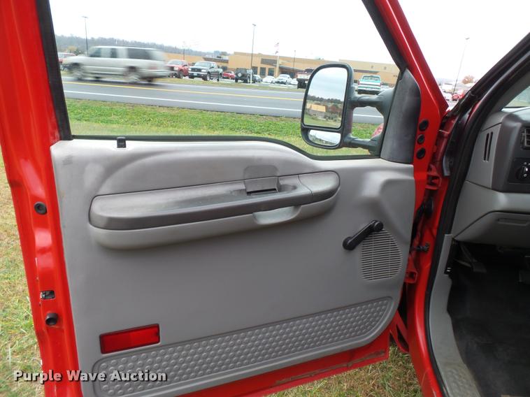 image for item K3426 2003 Ford F250 Super Duty Crew Cab flat bed truck