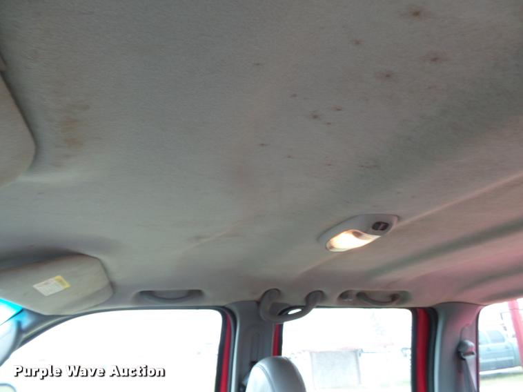 image for item K3426 2003 Ford F250 Super Duty Crew Cab flat bed truck