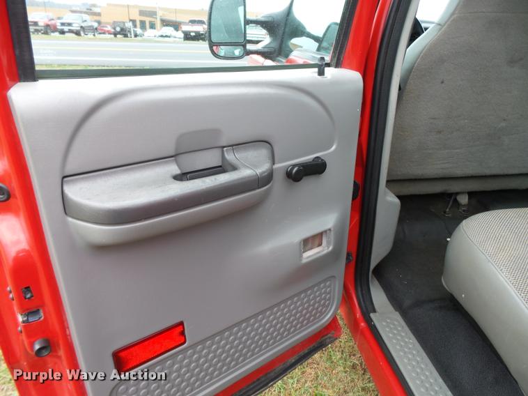 image for item K3426 2003 Ford F250 Super Duty Crew Cab flat bed truck