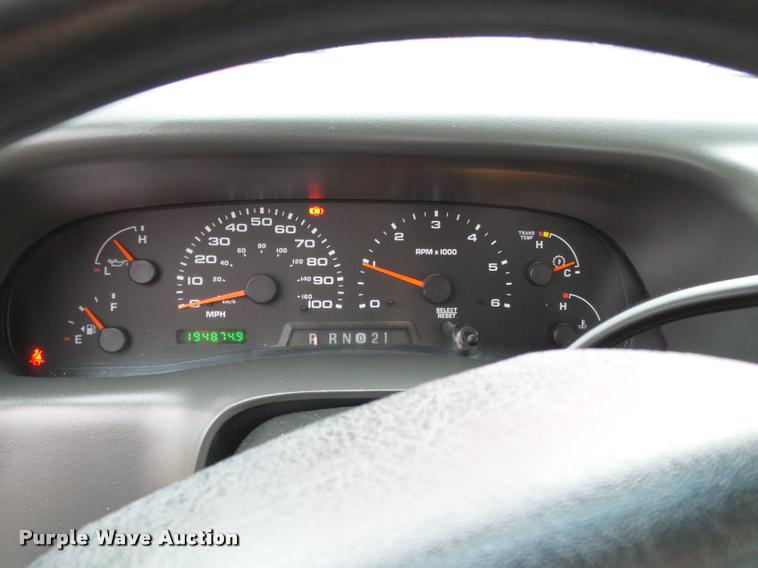 image for item K3426 2003 Ford F250 Super Duty Crew Cab flat bed truck