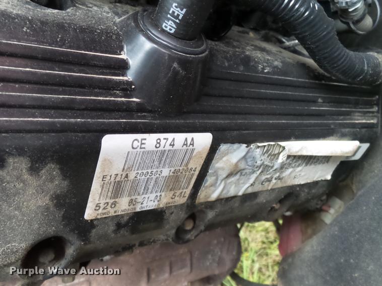 image for item K3426 2003 Ford F250 Super Duty Crew Cab flat bed truck