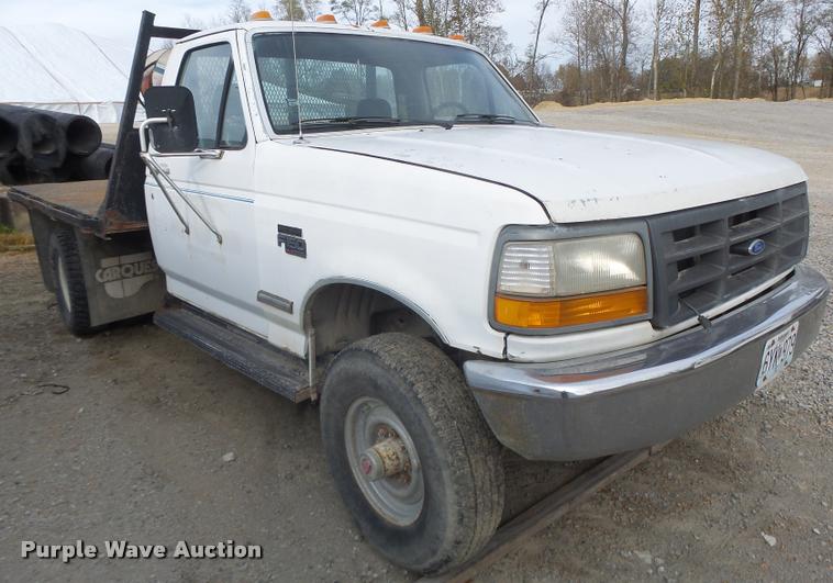 image for item K5545 1992 Ford F350 flatbed pickup truck