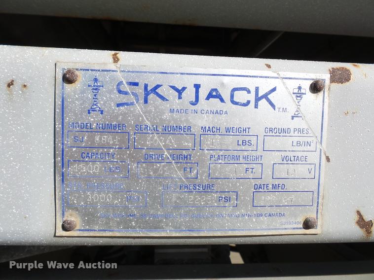 image for item J1615 1997 Skyjack 8841 scissor lift
