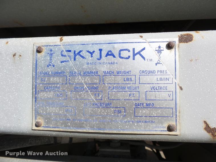 image for item J1615 1997 Skyjack 8841 scissor lift