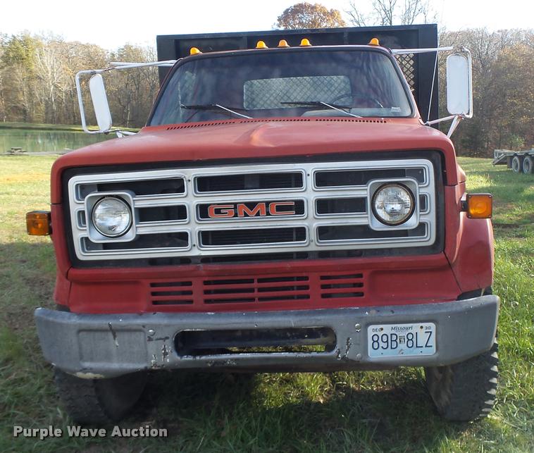 image for item K5556 1987 GMC C7D042 dump flatbed truck