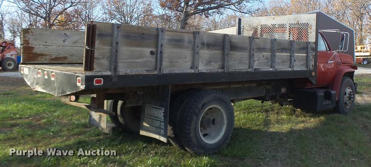 image for item K5556 1987 GMC C7D042 dump flatbed truck