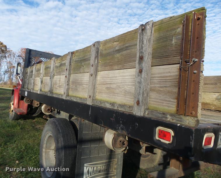 image for item K5556 1987 GMC C7D042 dump flatbed truck