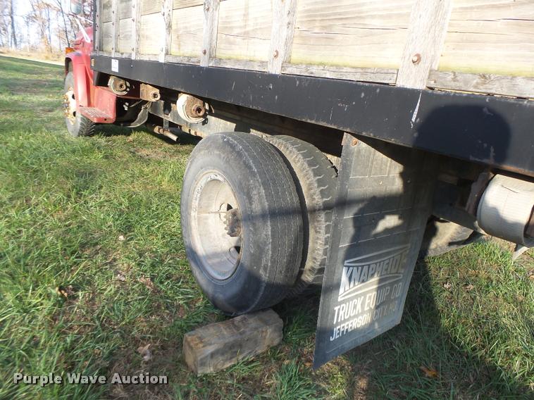 image for item K5556 1987 GMC C7D042 dump flatbed truck