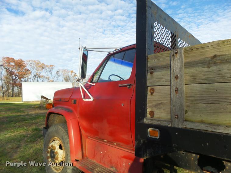 image for item K5556 1987 GMC C7D042 dump flatbed truck