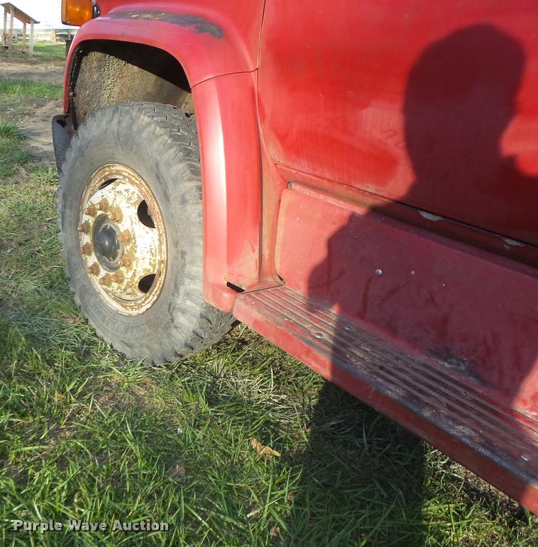 image for item K5556 1987 GMC C7D042 dump flatbed truck