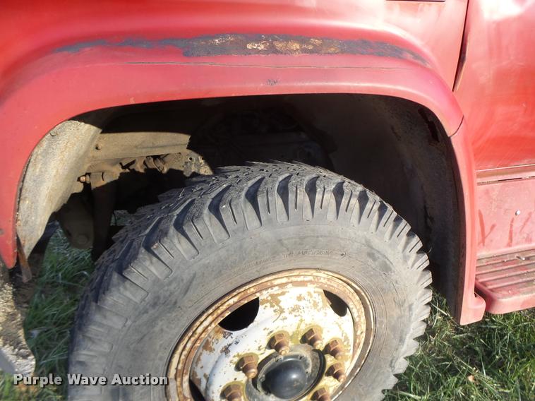 image for item K5556 1987 GMC C7D042 dump flatbed truck