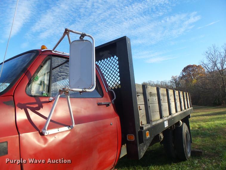 image for item K5556 1987 GMC C7D042 dump flatbed truck