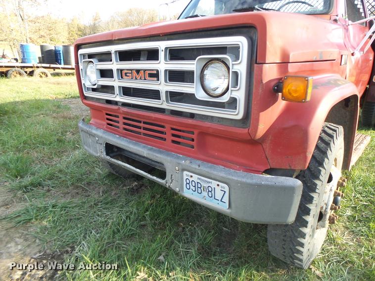 image for item K5556 1987 GMC C7D042 dump flatbed truck