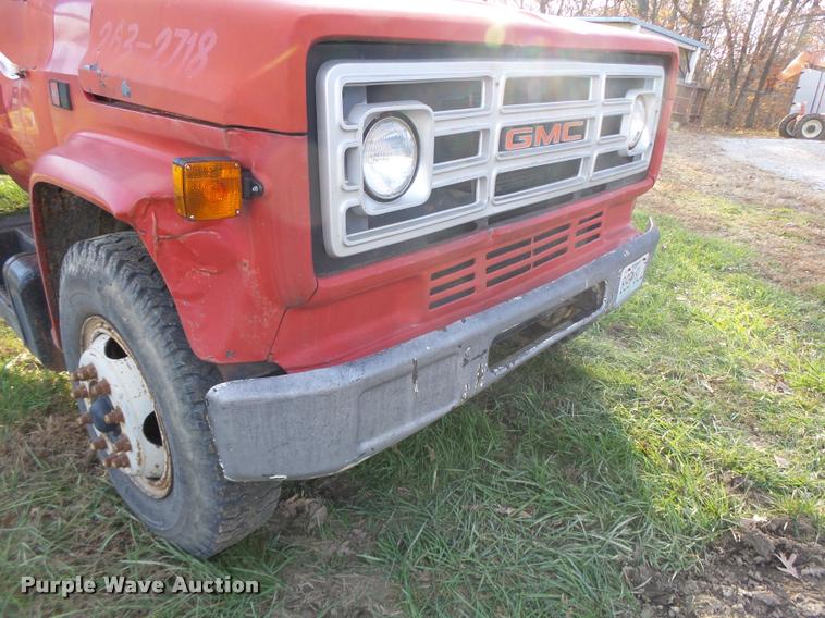 image for item K5556 1987 GMC C7D042 dump flatbed truck