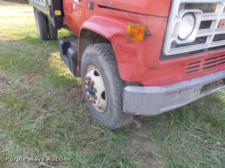 image for item K5556 1987 GMC C7D042 dump flatbed truck