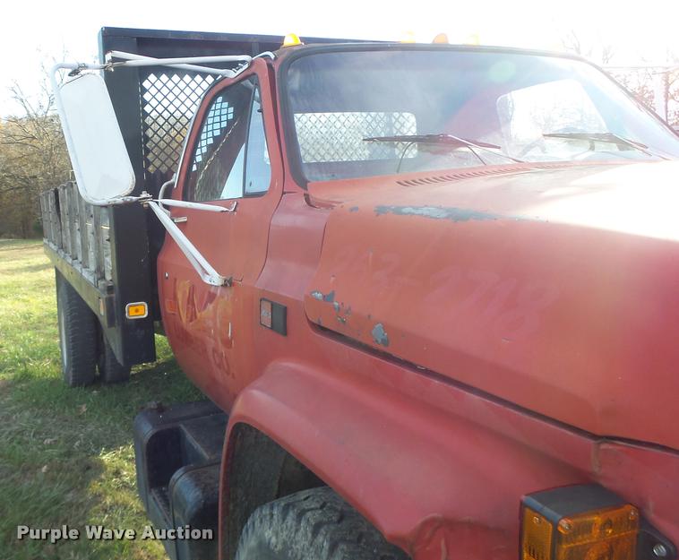 image for item K5556 1987 GMC C7D042 dump flatbed truck