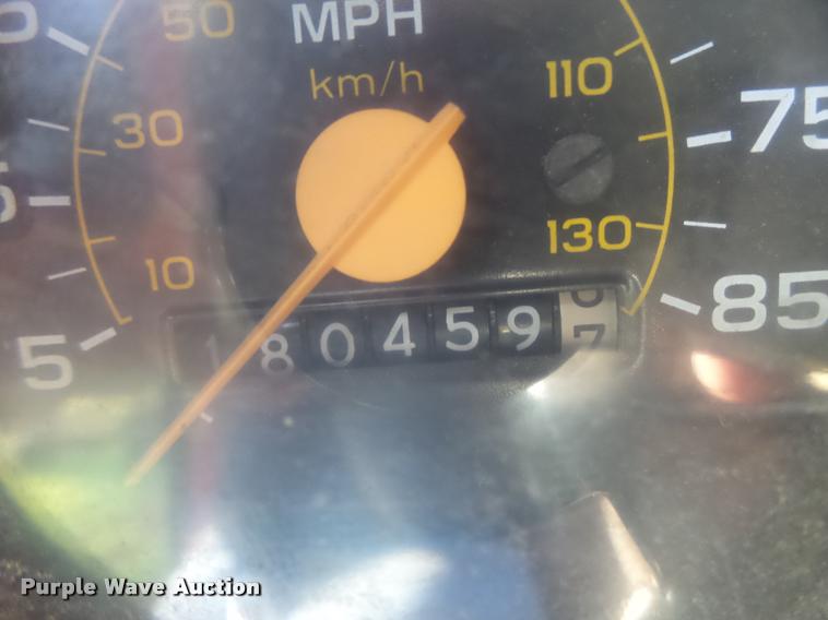 image for item K5556 1987 GMC C7D042 dump flatbed truck