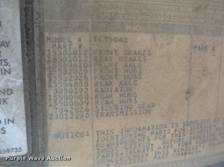 image for item K5556 1987 GMC C7D042 dump flatbed truck