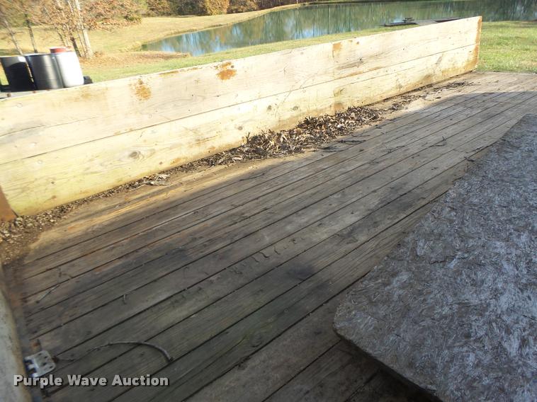 image for item K5556 1987 GMC C7D042 dump flatbed truck