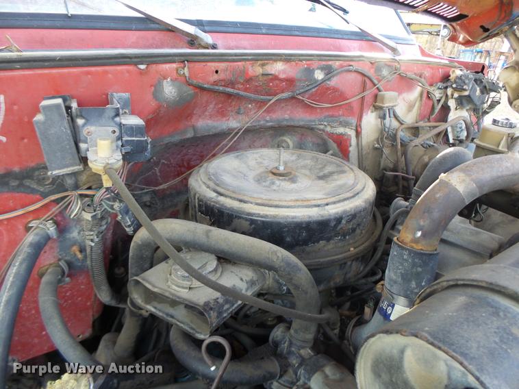 image for item K5556 1987 GMC C7D042 dump flatbed truck