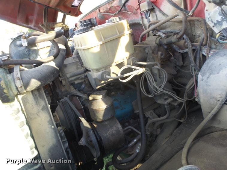 image for item K5556 1987 GMC C7D042 dump flatbed truck