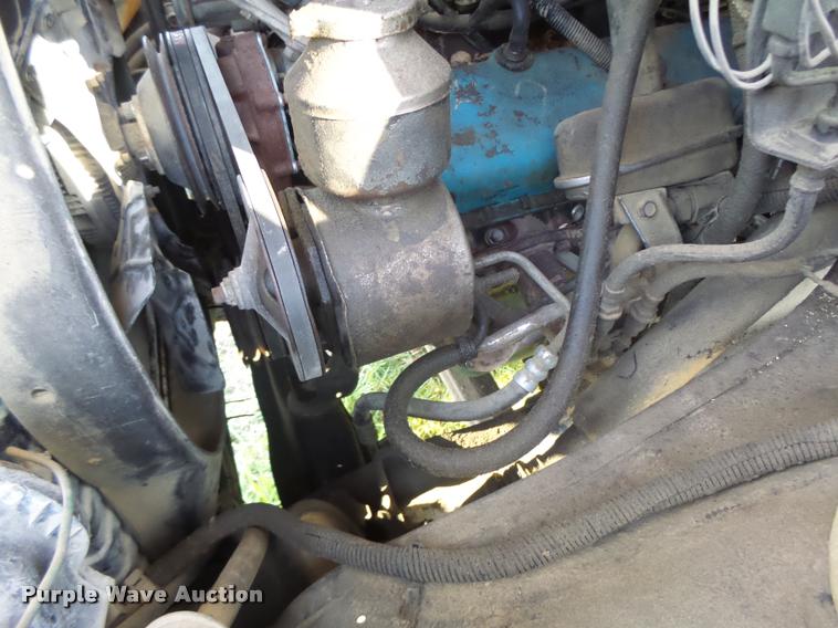 image for item K5556 1987 GMC C7D042 dump flatbed truck