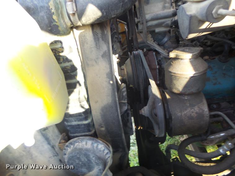 image for item K5556 1987 GMC C7D042 dump flatbed truck