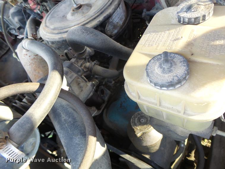 image for item K5556 1987 GMC C7D042 dump flatbed truck