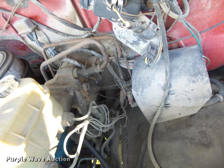 image for item K5556 1987 GMC C7D042 dump flatbed truck