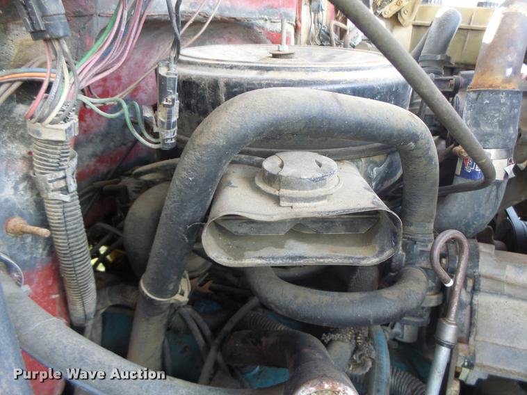 image for item K5556 1987 GMC C7D042 dump flatbed truck