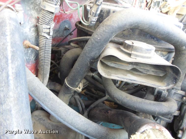 image for item K5556 1987 GMC C7D042 dump flatbed truck