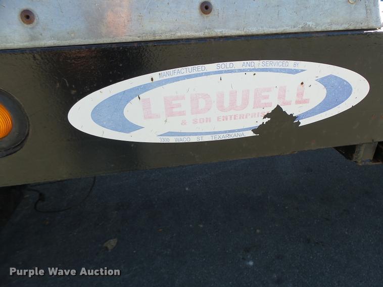 image for item K5590 2006 Ford F750 Super Duty rollback truck