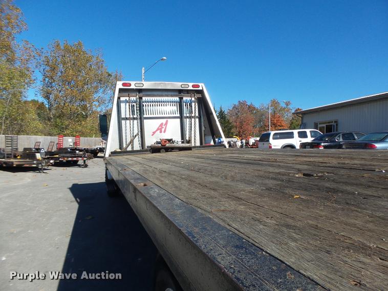 image for item K5590 2006 Ford F750 Super Duty rollback truck