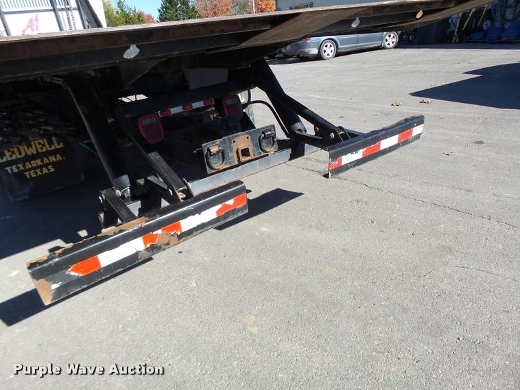 image for item K5590 2006 Ford F750 Super Duty rollback truck