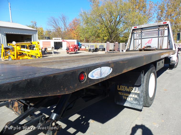 image for item K5590 2006 Ford F750 Super Duty rollback truck