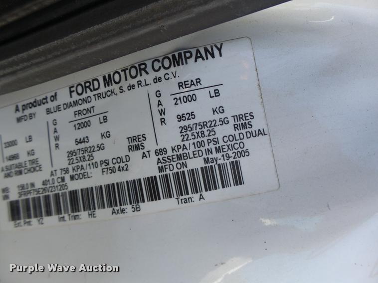 image for item K5590 2006 Ford F750 Super Duty rollback truck