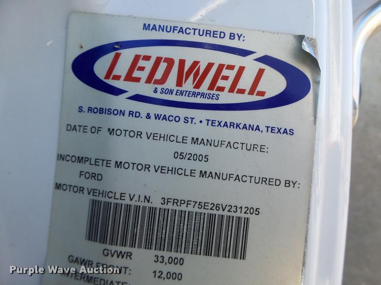 image for item K5590 2006 Ford F750 Super Duty rollback truck