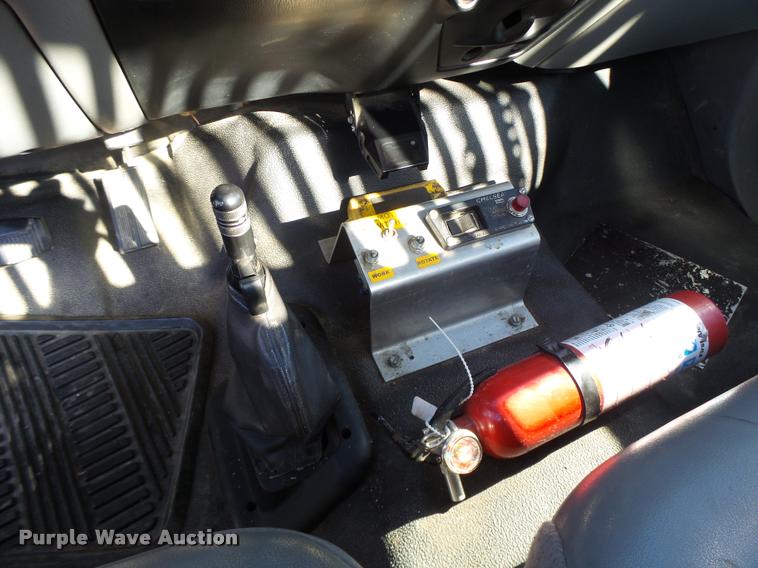 image for item K5590 2006 Ford F750 Super Duty rollback truck