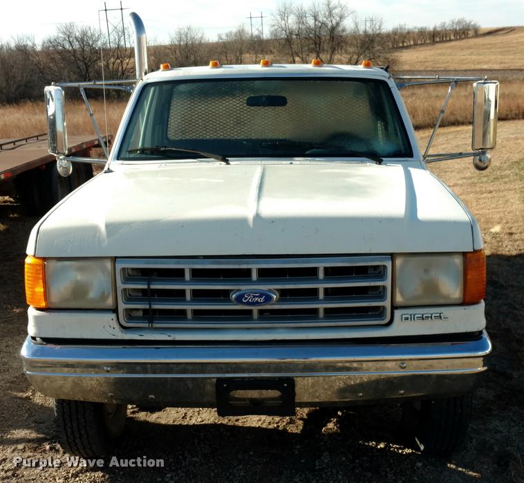 image for item DB0788 1990 Ford F450 Super Duty flatbed truck